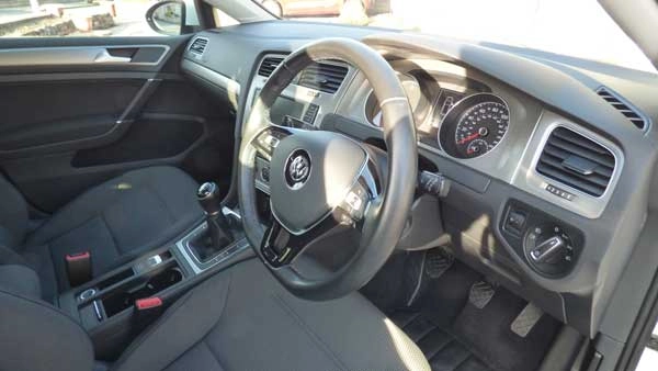 Driving instructor training taking place inside a training car