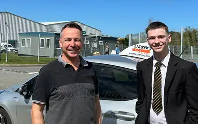 Chris Jolley from Llandudno at Bangor Driving Test Centre with his part 3 pupil