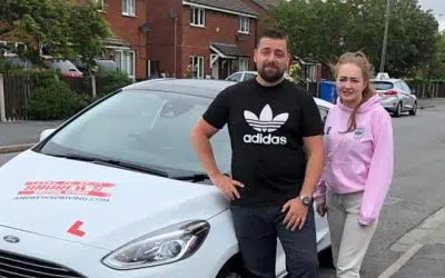 Tomas outside Rhyl Driving test Centre with his part 3 pupil